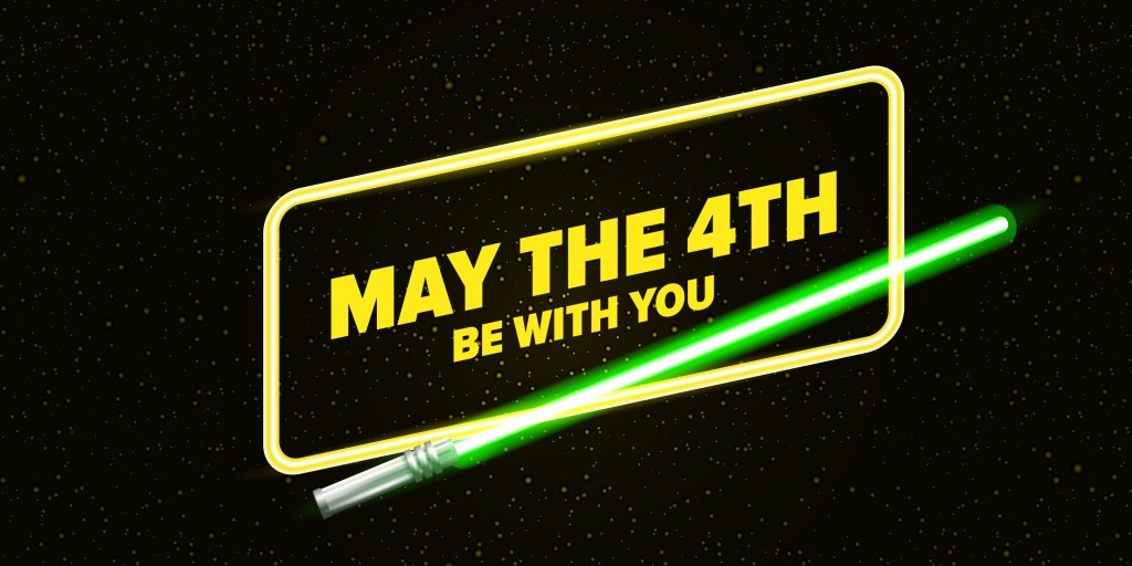 The phrase "May the 4th be with you" with a green lightsaber underneath it.